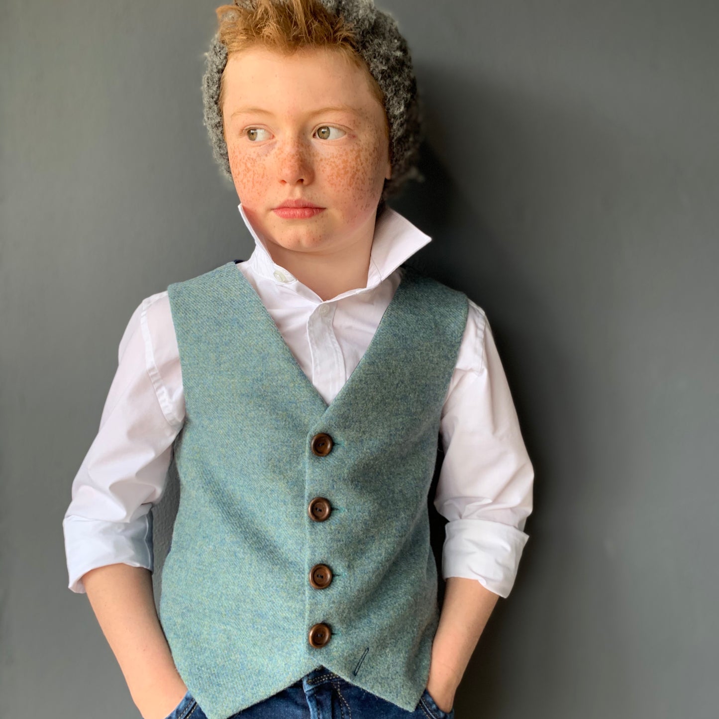 'P.T.Barnum 2023’ Boys waistcoat handmade in dolphin blue British tweed
