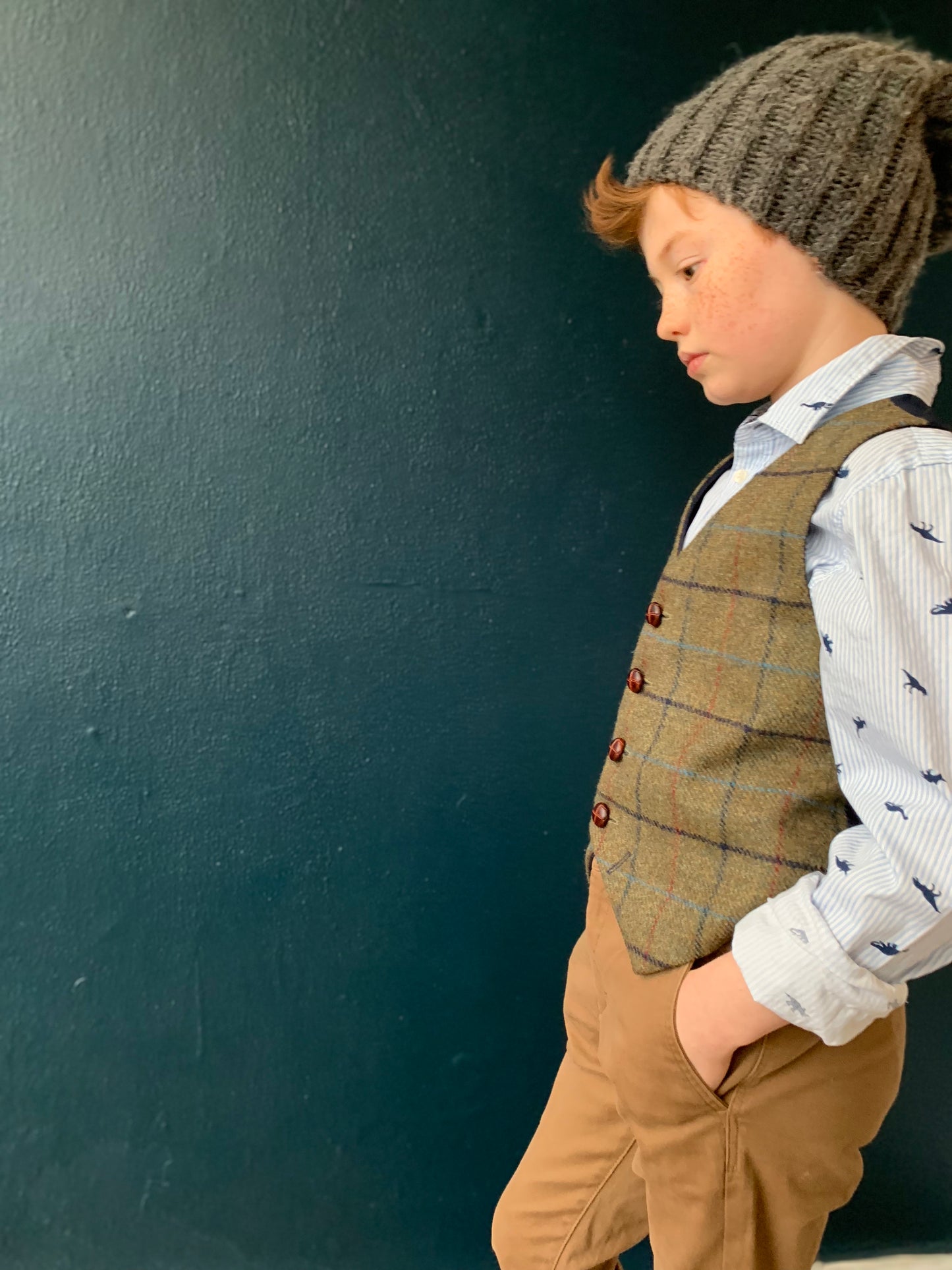 'Master George' Boys waistcoat handmade in soft olive green shetland wool with red, navy and blue over check.